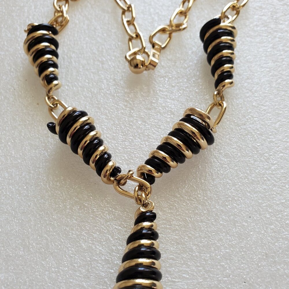 A Gold & Black say a twirly cone necklace, great condition,wt33 grams item#A-35